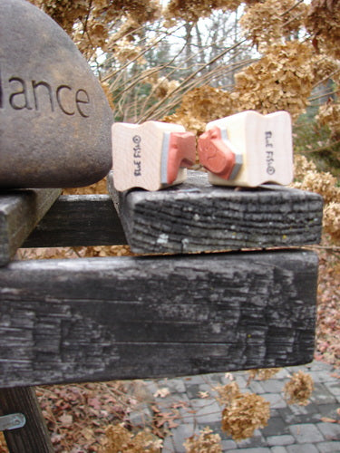 1997 New Rubber Stamps City Slicker Theme: Close-up of two unused rubber stamps with wooden blocks on a bench, perfect for customizing stationary or decorating wrapping paper.