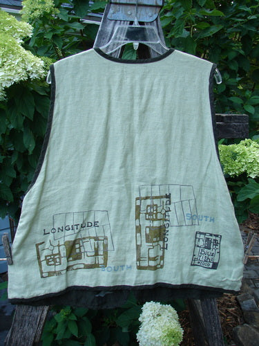 2000 Cross Dye Linen Edge of the World Vest Directional Grid Celery Size 0 on a hanger, featuring looped button closures, handmade ceramic buttons, rolled piping, and a varying hemline with an A-line shape.