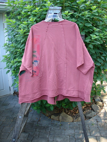 Barclay NWT Photogram Open Front Jacket Walt Whitman Script Desert Rose OSFA featuring wide three-quarter sleeves, angular hem, and dolman shoulders, displayed on a swinger for Bluefishfinder.com.