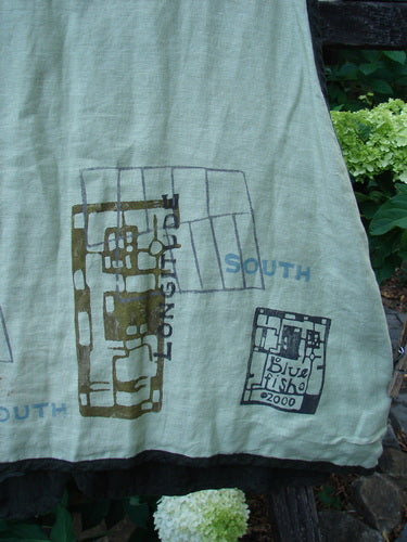 2000 Cross Dye Linen Edge of the World Vest Directional Grid Celery Size 0, featuring rolled piping, looped button closures, handmade glazed ceramic buttons, and a varying hemline with an A-line shape.