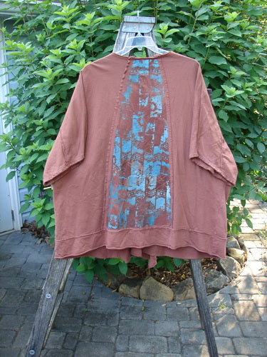 Barclay Photogram Open Front Santa Fe Jacket Garden Scrape Desert Clay OSFA displayed on a hanger, showcasing three-quarter sleeves, open front, angular hem, and raw edges, embodying Bluefishfinder.com's vintage style.