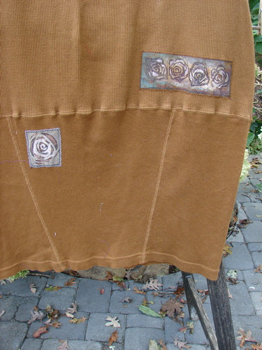 Barclay Patched Thermal Parlor Skirt Floral Copper Size 0 featuring intricate flower designs, showcasing superior patches, vertical and horizontal stitchery, and a signature Barclay patch on thick cotton thermal fabric.