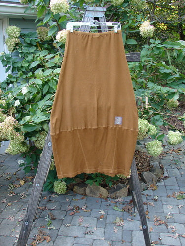 Barclay Patched Thermal Parlor Skirt Floral Copper Size 0 hanging on a clothesline, showcasing its unique bell shape and intricate patchwork design.