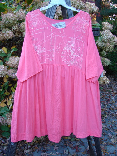 Barclay NWT Textured Terrarium Dress Contour Travel Geranium Size 2 displayed outdoors on a swing, featuring three-quarter length sleeves and a sweeping A-line design with a downward curved waist seam.