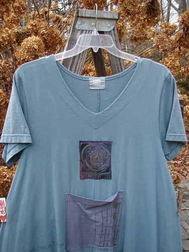 2000 PMU City Side Dress Directional Puddle Size 1 featuring a patch on the front, three painted pockets, and a V-shaped neckline, showcasing Bluefishfinder's unique and vintage style.