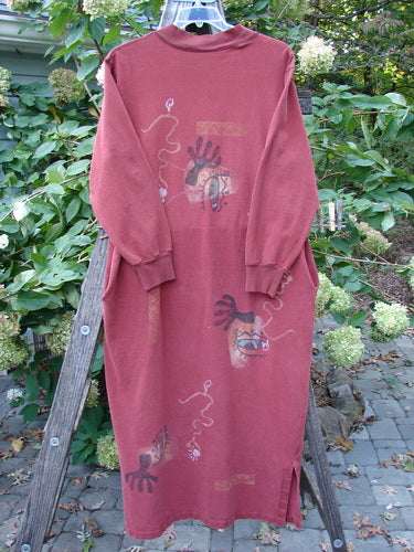 1996 Pastime Dress Abstraction Ember Size 2 features a face design, long sleeves, ribbed V-neck, vented sides, and deep pockets, showcasing vintage Blue Fish Clothing's creative and individual style.