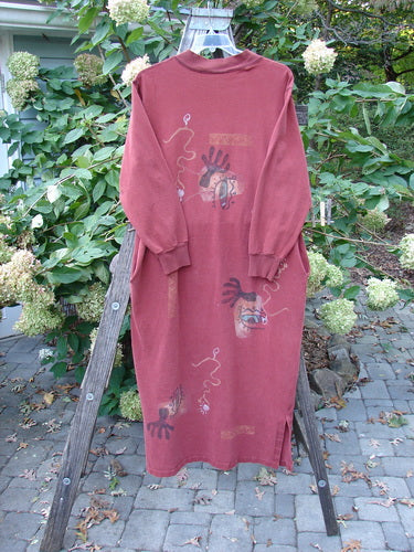 1996 Pastime Dress Abstraction Ember Size 2 displayed on a wooden stand, showcasing its full-length design, V-neckline, ribbed cuffs, and unique abstraction theme paint, embodying vintage Blue Fish Clothing's creative style.