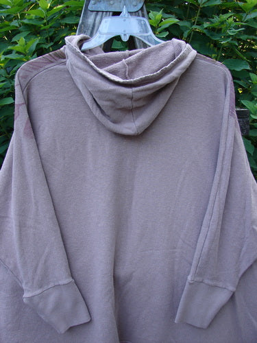 Barclay Cotton Hemp Hooded Folklore Pullover Tiny Floral Mallow OSFA displayed on a swinger, showcasing its cordless hood, ribbed cuffs, long sleeves, flared swing, and dual drop exterior painted pockets.