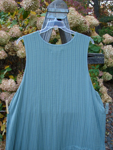 Barclay NWT Gauze Varano Jumper Olive Navy Pinstripe Size 2 displayed on a swing, featuring ruffled hem, diagonal bodice, and upper exterior pocket.