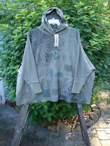 Barclay NWT Cotton Hemp Hooded Folklore Pullover Blossom Grey Lolite OSFA, featuring cozy cordless hood, ribbed cuffs, wide flared swing, dual drop painted pockets, crafted from mid-weight organic cotton hemp blend.