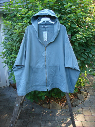 Barclay NWT Hooded Postcard Zipper Jacket Vest Rear Tree Love Delaware Green OSFA features a cozy hood, full zipper, roomy pockets, dolman shoulders, and a unique hemline on a wooden stand.