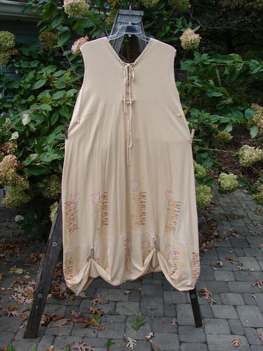 Barclay Salt Water Taffy Jumper Tulip Garden Wheat Size 2, featuring versatile rippie accents, front tie-off pockets, and shell-textured buttons, displayed on a rack with intricate fashion design patterns.