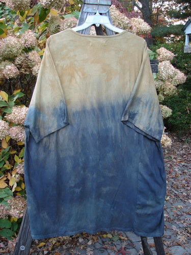 Barclay NWT Art Top Sunfield Bronze Gold OSFA: A blue and tan tie-dye shirt with a longer tunic length, drop shoulders, loose three-quarter sleeves, rounded neckline, and varying hemline.