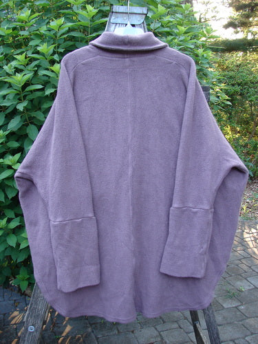 Barclay Patched Celtic Moss Deco Coat Unpainted Aubergine Dust OSFA features a dense textured fabric with drop dolman shoulders, deep arms, and oversized foldable sleeves, showcasing a unique vintage-inspired design.