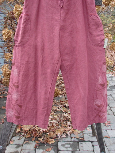 Barclay Linen Heavy Tie Travel Pant Tiny Birdie Merlo Size 2 with wide legs and triangular side inserts, featuring two front wrap pockets and an elastic drawcord waist.