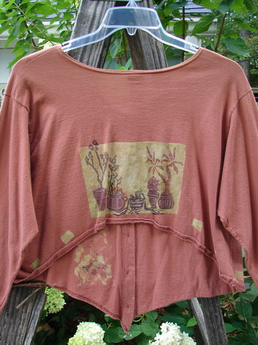 1994 Curve Shirt Potted Sunflower Ochre Size 1 features a V-shaped neckline, varying hemline, original buttons, and potted sunflower theme paint, showcasing its unique design and vintage appeal.