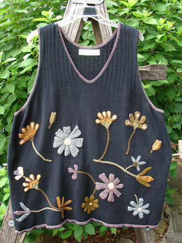 1998 Limited Edition Peruvian Embroidered Sweater Vent Tunic Floral Vine Black OSFA featuring detailed embroidered floral vines, contrasting whip stitching, yarn-covered buttons, and side vents on a soft black cotton knit.