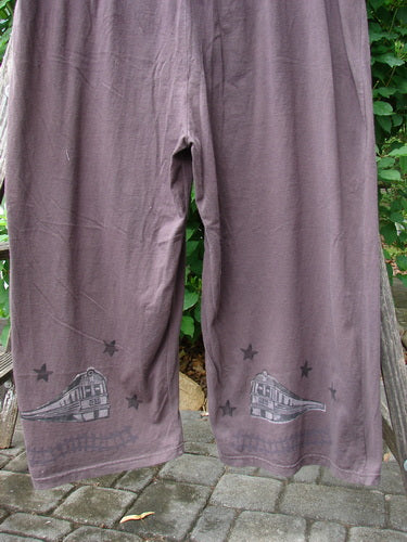 1993 Wide Pant Overall Jumper Star Path Travel Redyed Dark Plum Size 1 features wide, swingy belled legs and original front buttons, showcasing vintage-themed illustrations, embodying Bluefishfinder.com's creative and expressive style.
