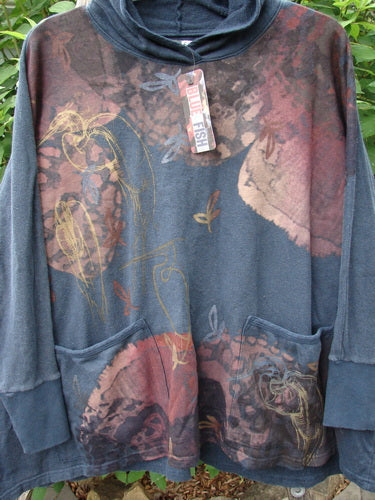 Barclay NWT Cotton Hemp Hooded Folklore Pullover Beach Bird Atlantic OSFA, showcased on a tree, features long sleeves, ribbed cuffs, and two painted pockets, reflecting Bluefishfinder.com's vintage-inspired, creative style.