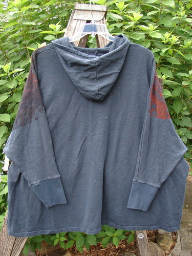 Barclay NWT Cotton Hemp Hooded Folklore Pullover Beach Bird Atlantic OSFA: A heavy-weight organic cotton hemp hoodie on a rack, featuring a cordless hood, flared swing, and dual painted pockets.