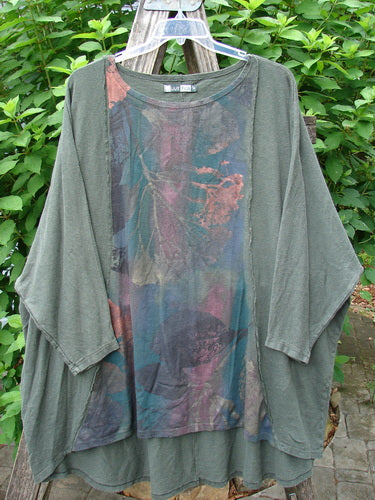 Barclay Cotton Hemp Exterior Stitch Hi Low Tunic Metallic Floral Green Stick OSFA features a dolman sleeve design, metallic floral pattern, and unique high-low hem, embodying Bluefishfinder.com's vintage, expressive style.