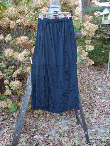 Barclay Brocade Willow Skirt Unpainted Black Size 2: A beautiful embroidered rayon skirt with a trailing floral pattern, elastic waistline, and unique side accents. Perfect for layering or as a standalone piece.