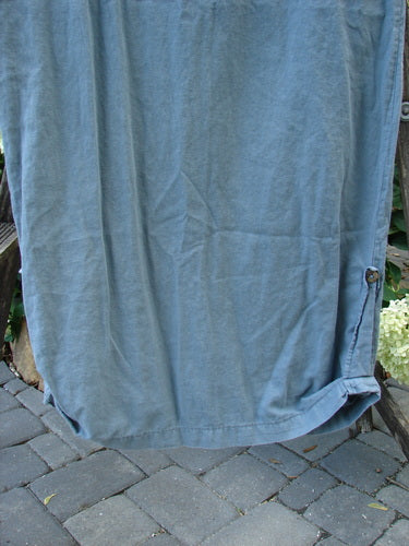 2000 Almost Seven Jumper Stone Path Blue Mineral Altered Size 1 displayed on a clothesline, showcasing button shoulders, rounded neckline, and unique tabbed sides at the hem.