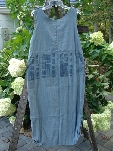 2000 Almost Seven Jumper Stone Path Blue Mineral Altered Size 1, displayed on a wooden stand showing button shoulders, rounded neckline, yoke seams, and tabbed sides at the hem.