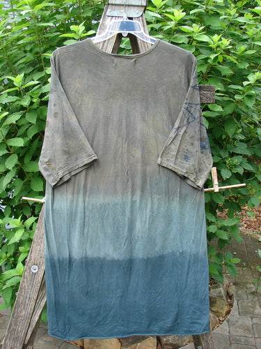 Barclay Tournesol Slim Tunic Sea Botanicals Mottled Brown Ocean OSFA featuring a longer tunic length, drop shoulders, loose three-quarter sleeves, rounded neckline, and varying hemline, highlighting unique sea botanical patterns.