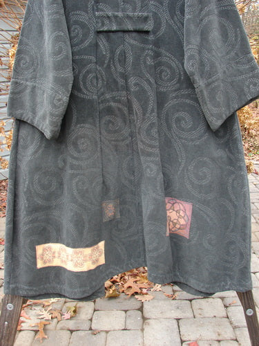 2000 Patched Upholstery Diwmach Coat Swirl Black Size 2, featuring a damask swirl pattern, colorful patches, large pockets, scalloped neckline, vintage buttons, belled sleeves, and pleated rear.