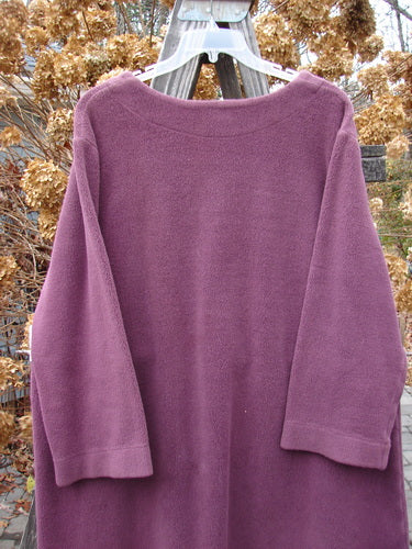 2000 Celtic Moss Hobo Coat Unpainted Murple Size 1: A purple sweater on a clothes rack, made from incredible Celtic Moss.