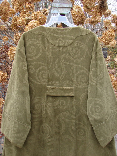2000 Patched Upholstery Diwmach Coat Swirl Pine Size 2, featuring a damask swirl pattern, colorful patches, vintage buttons, belled sleeves, large pocket, and a scalloped neckline.