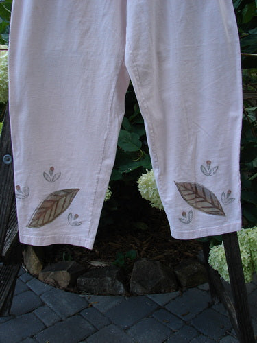 1999 Simple Vent Pant Fallen Leaf Orchid Size 1 features leaf-themed paint, full elastic waist, ankle vents, and two side pockets, made from organic mid-weight cotton.