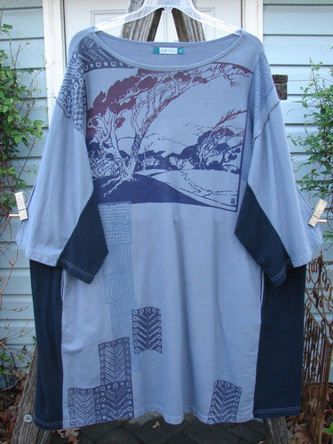 Barclay Cotton Interlock Contrast Side Panel Tunic Scenic Travel Sky Black Size 2 featuring a landscape print on the front, three-quarter wide sleeves, and distinctive side panels, embodying Bluefishfinder's vintage, expressive style.