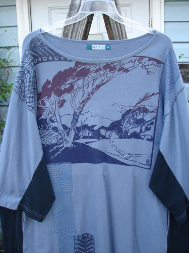 Barclay Cotton Interlock Contrast Side Panel Tunic Scenic Travel Sky Black Size 2 on a rack, featuring a landscape design, three-quarter wide sleeves, boatneck, and deep side pockets.