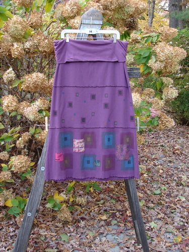 Barclay Patched Thermal Fold Over Pencil Panel Skirt Grid Stripe Magenta Size 2 displayed on a rack, showcasing its fold-over waistline, horizontal stitchery, and tiny hem patches.