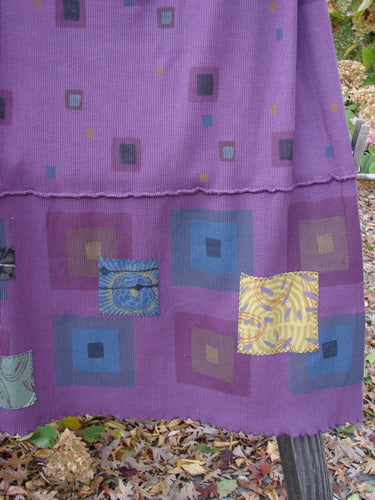 Barclay Patched Thermal Fold Over Pencil Panel Skirt in magenta, featuring a grid stripe pattern with horizontal stitching and tiny patches along the hem. Size 2, made from organic cotton thermal.