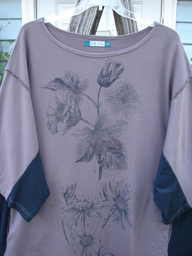 Barclay Cotton Interlock Contrast Side Panel Tunic Floral Plum Black Size 2 featuring a flower design, three-quarter sleeves, boatneck, and contrasting side panels, embodying BlueFishFinder's vintage and creative style.