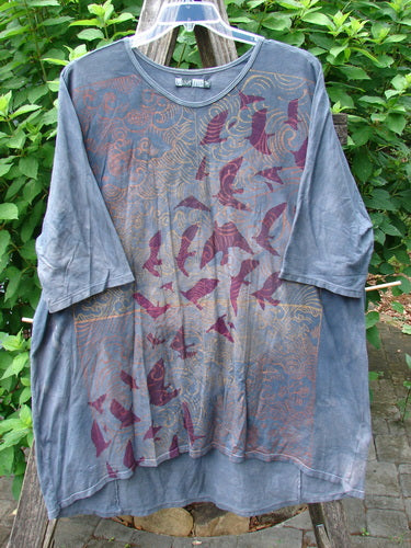 Barclay Tournesol Tunic Gull Flock Mottled Night Sky OSFA features a bird pattern, loose three-quarter sleeves, drop shoulders, and a rounded neckline, designed for a versatile, creative expression.