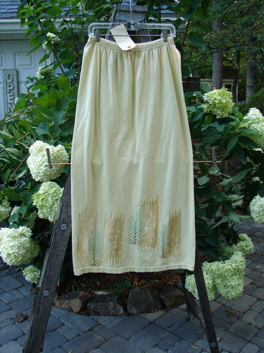 2000 Straight Skirt Pine Forest Plantain Size 1 on a clothing rack, showcasing a full elastic waistband and slight A-line shape with a pine forest theme along the hem.