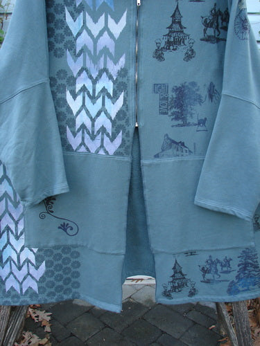 Barclay Fleece Hooded Zip Pocket Jacket Equestrian Light Love Mirror Size 3, featuring a generous hood, half zip, kangaroo pockets, and equestrian-themed painted designs, with a cozy, longer silhouette.