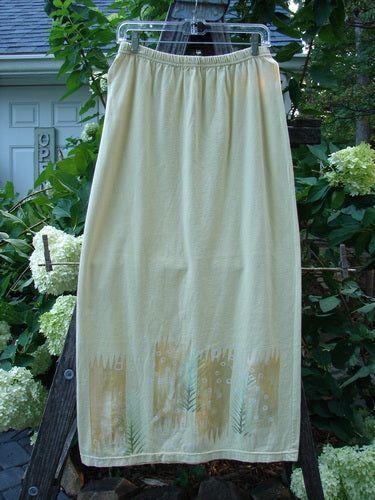 2000 Straight Skirt Pine Forest Plantain Size 1, featuring a full elastic waistband and A-line shape, hanging on a clothesline.