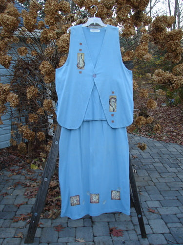 1997 Elements Dock Straight Duo Shells Atlantis Size 2, featuring a blue vest with a single button closure and matching straight skirt with sea life theme, displayed on a wooden stand.