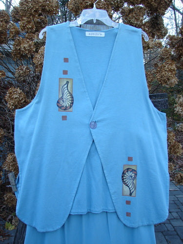 Image alt text: 1997 Elements Dock Straight Duo Shells Atlantis Size 2 blue vest with a design, made from organic cotton, featuring a single button closure, signature patch, high vented rounded sides, and a drawcord back. Straight skirt with elastic waistband, adorned in matching sea life theme.