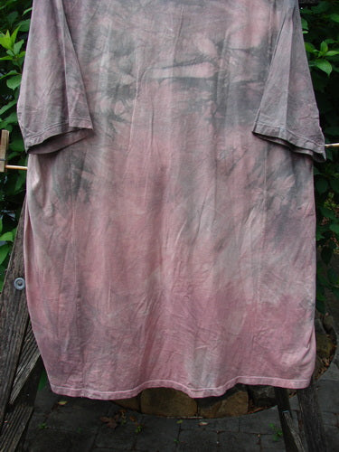 Barclay Tournesol Tunic Bunny Field Mottled Mauve OSFA features a tie-dye pattern with a rounded neckline, drop shoulders, and three-quarter sleeves, showcasing a unique bunny theme design.