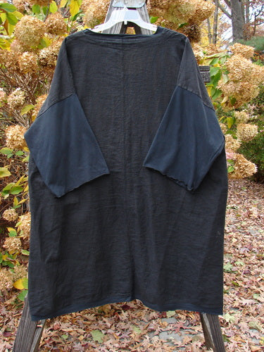 Barclay Cotton Sleeve Pocket Cardigan Unpainted Black Size 2, featuring long sleeves, wooden-like buttons, drop shoulders, V-shaped neckline, and front pockets, displayed against a neutral background.