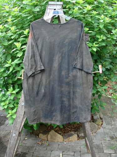 Barclay Tournesol Tunic Daisy Crane Metallic Bark OSFA, displayed hanging outdoors, features a loose fit, rounded neckline, three-quarter sleeves, and varying hemline, reflecting Bluefishfinder.com's vintage, expressive clothing style.