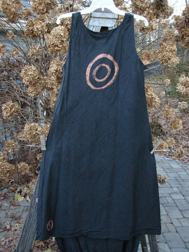 2000 Signed by Jen Shaunting Silk Gather Duo Spin Size 1 featuring a black dress with a large circular embellishment at the center, paired with a matching crushed skirt.