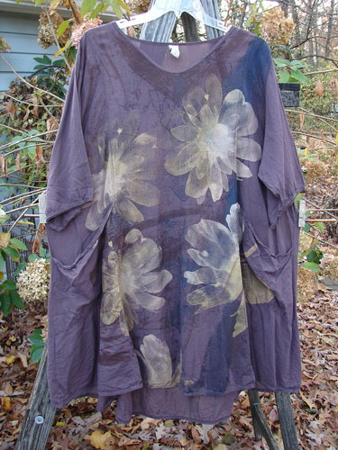 Barclay Linen Drawback Pocket Tunic Golden Daisy Plum Size 2, featuring a floral pattern, short sleeves, and lightweight design, exemplifies Bluefishfinder.com's vintage-inspired clothing, offering creative freedom and individuality.