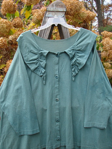 1994 Fallen Leaves Jacket on a swinger, made of Mid Weight Cotton, with Blue Fish Buttons and a Sweet A Line Shape.